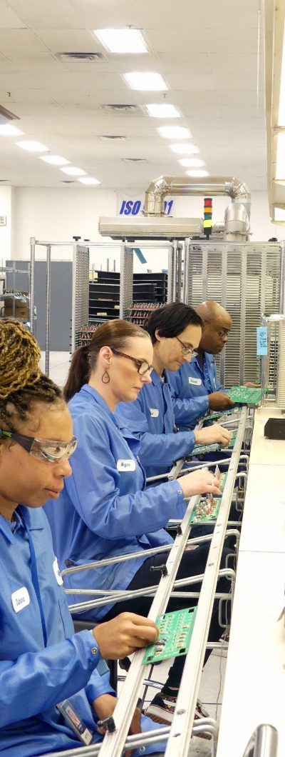 An assembly line in the Milwaukee Electronics facility